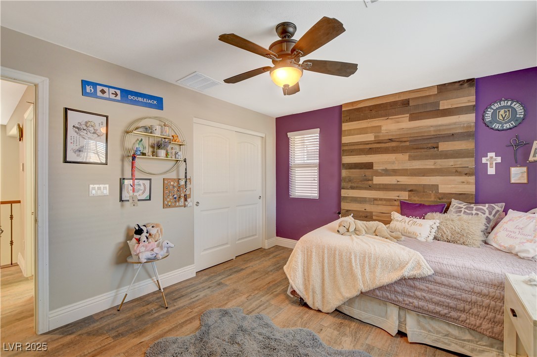5741 Shadow Bend Drive Las Vegas, NV 89135 - Photo 47 of 78 Bedroom with visible vents, ceiling fan, an accent
