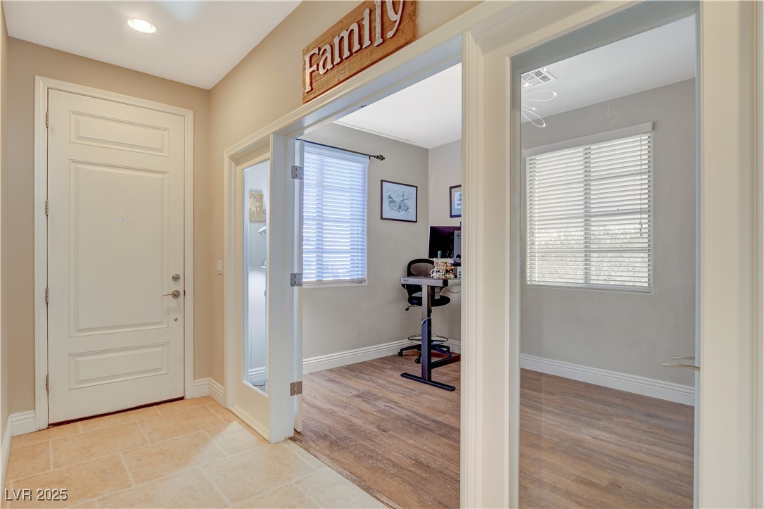 5741 Shadow Bend Drive Las Vegas, NV 89135 - Photo 6 of 78 Entrance foyer with light wood-type flooring, base