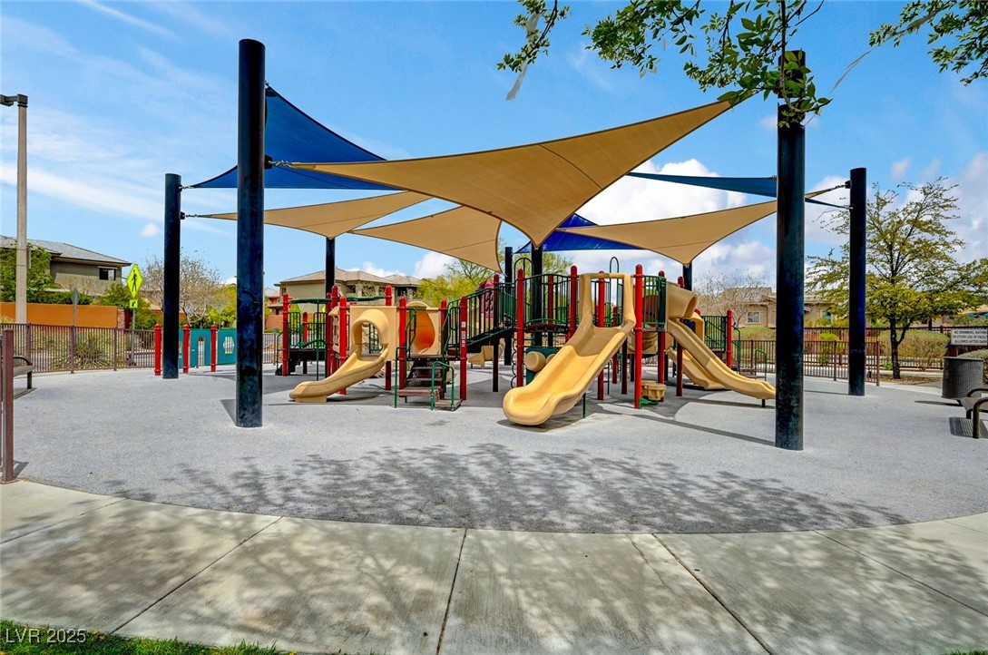 5741 Shadow Bend Drive Las Vegas, NV 89135 - Photo 72 of 78 Community playground featuring fence