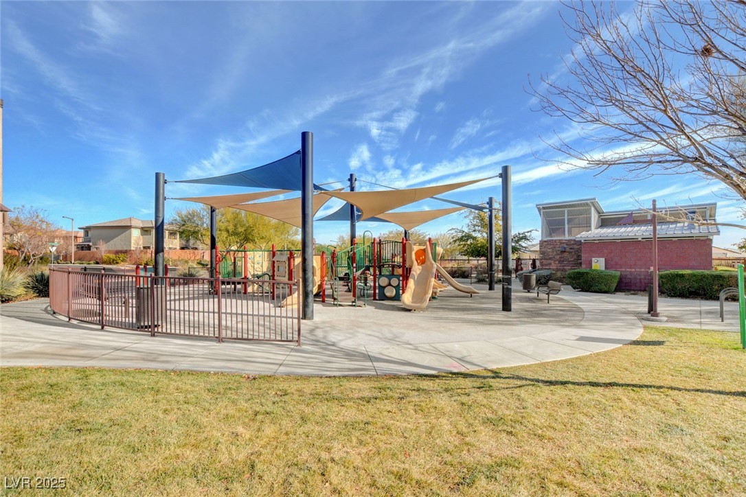 5741 Shadow Bend Drive Las Vegas, NV 89135 - Photo 73 of 78 Community play area featuring fence and a yard