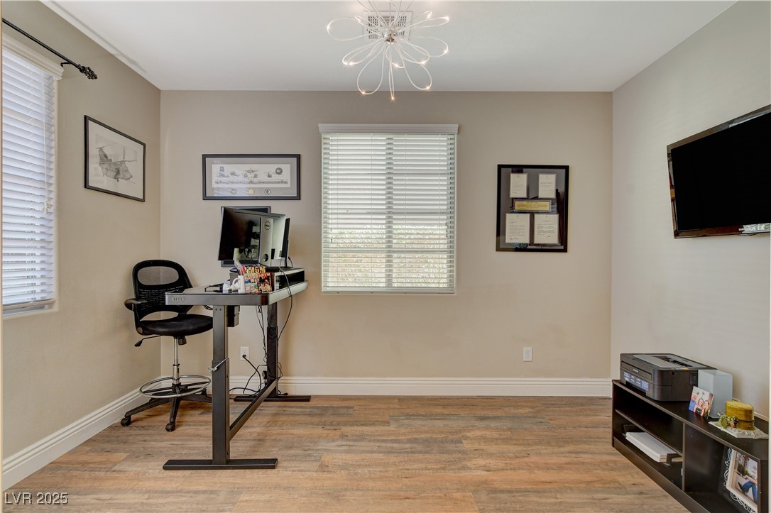 5741 Shadow Bend Drive Las Vegas, NV 89135 - Photo 8 of 78 Workout room featuring an inviting chandelier, lig