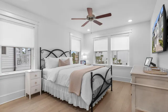 a bedroom with bed and window