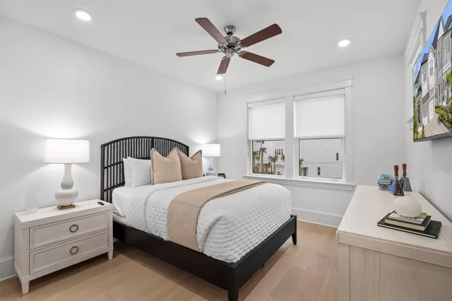 a bedroom with a bed and window