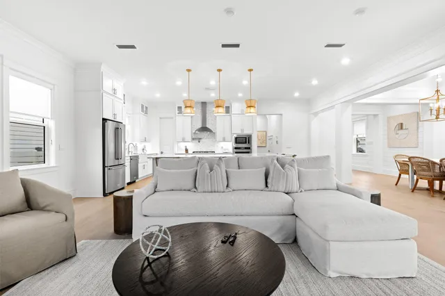 a living room with furniture and a table