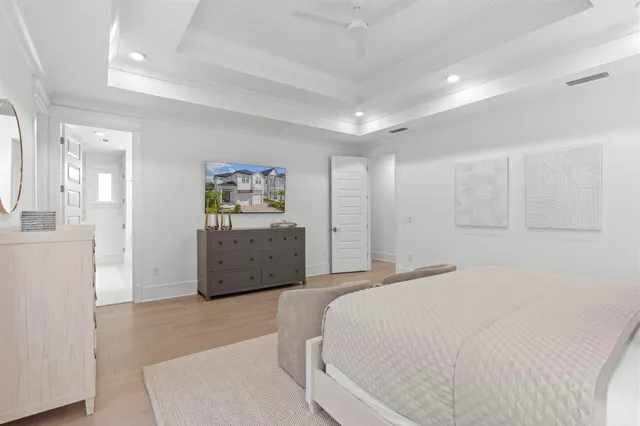 a bedroom with a bed and a cabinets