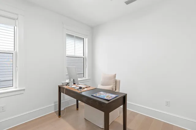 a room with a table and a window