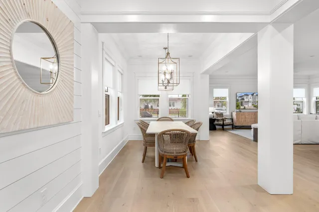 a view of a livingroom with furniture and a window