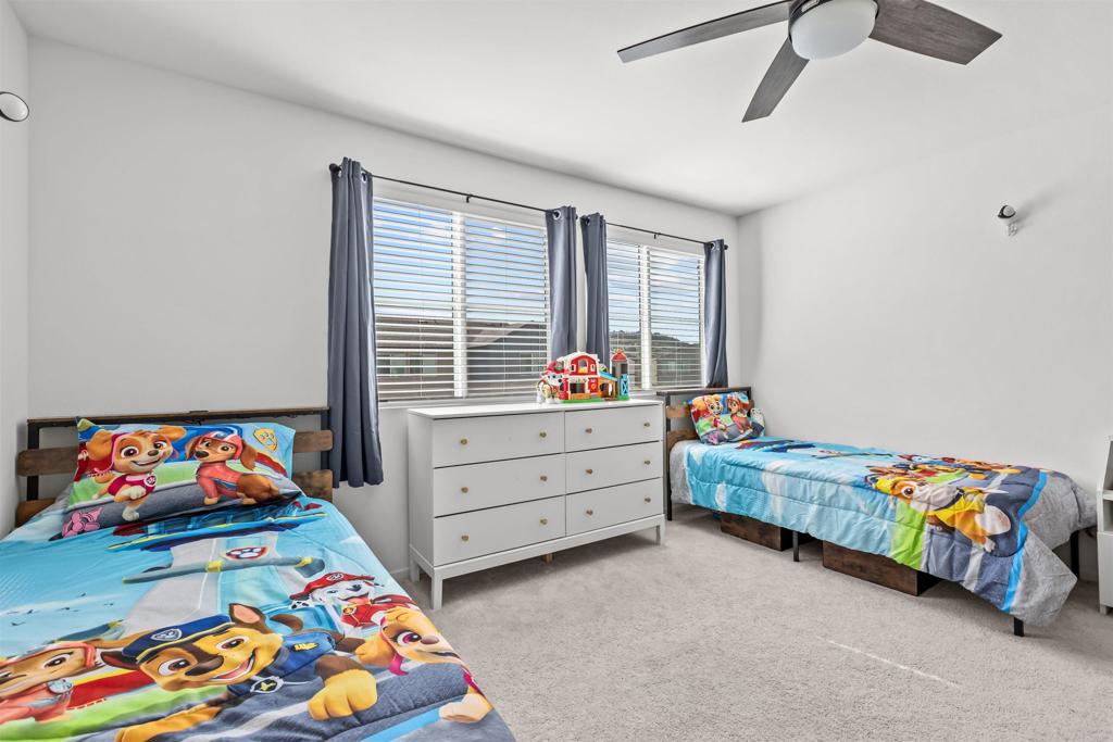 228 Hass Lane Fallbrook, CA 92028 - Photo 15 of 26 a bedroom with a bed and a dresser