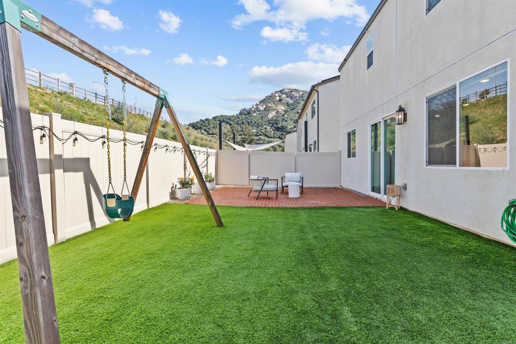 228 Hass Lane Fallbrook, CA 92028 - Photo 17 of 26 a view of yard with a slide