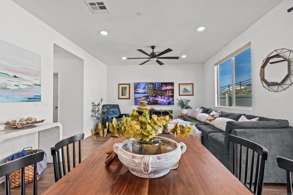 228 Hass Lane Fallbrook, CA 92028 - Photo 9 of 26 a living room with furniture and a window