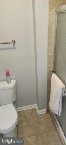 a bathroom with a toilet and a sink