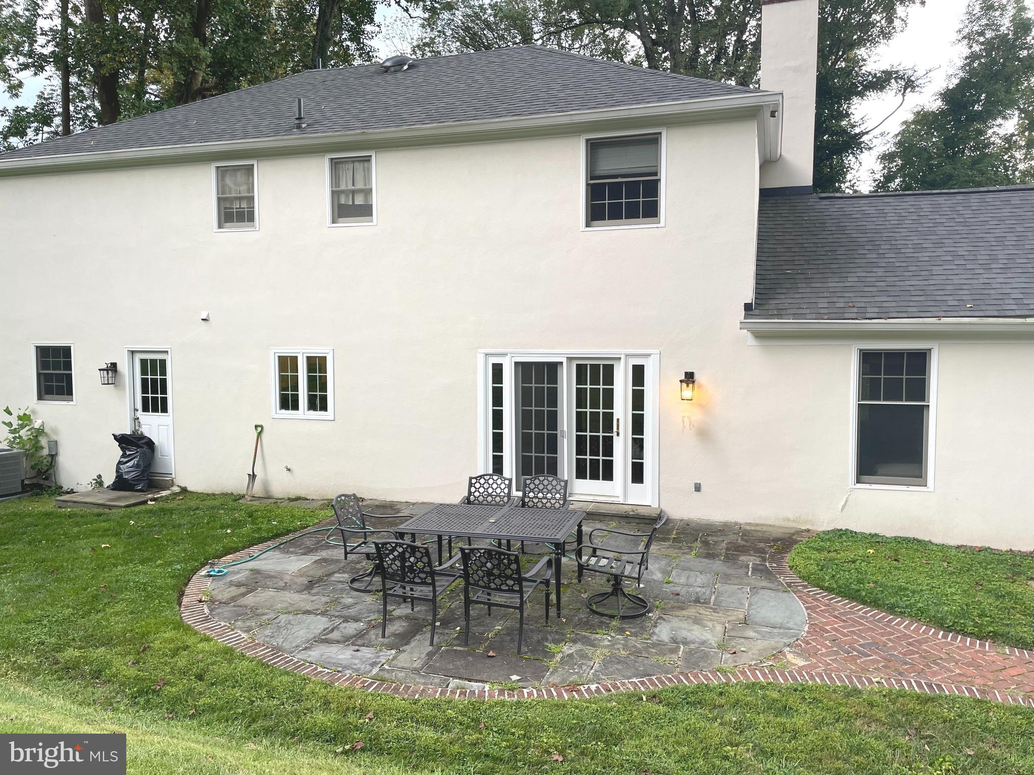 611 Andover Road Newtown Square, PA 19073 - Photo 26 of 27 a view of a house with a yard