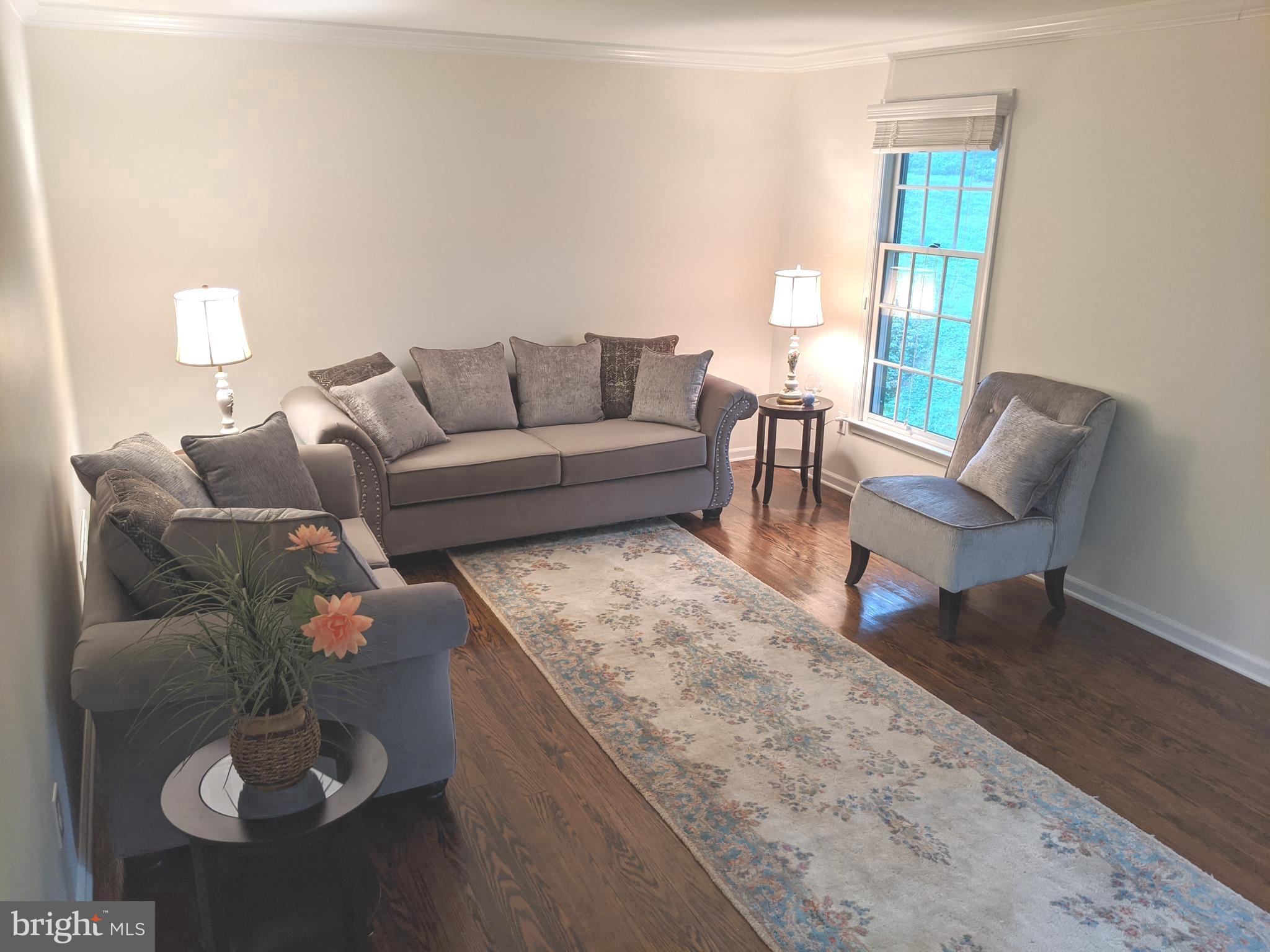 611 Andover Road Newtown Square, PA 19073 - Photo 3 of 27 Living Room with Hardwood Floors