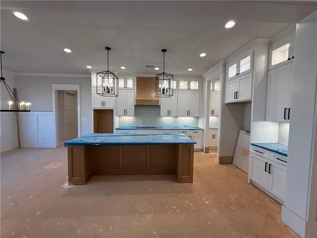 an empty room that has a window in it