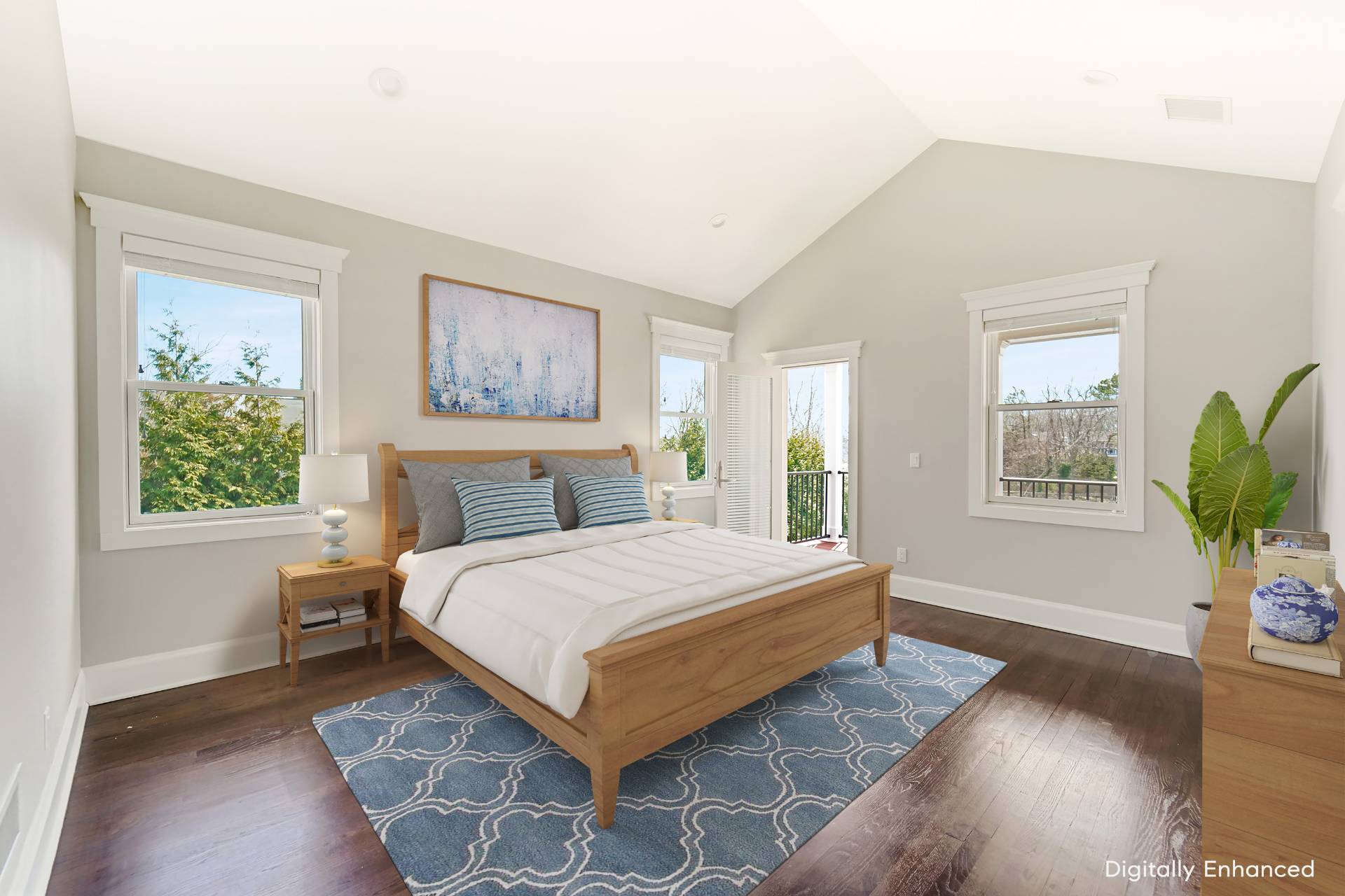 64 Romana Drive Hampton Bays, NY 11946 - Photo 19 of 29 a bedroom with a large bed and a wooden floor