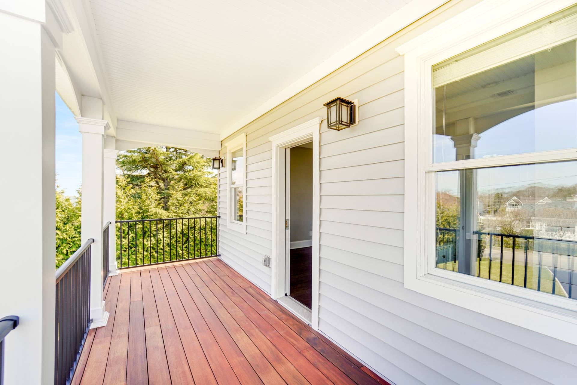 64 Romana Drive Hampton Bays, NY 11946 - Photo 28 of 29 a view of a balcony with wooden floor