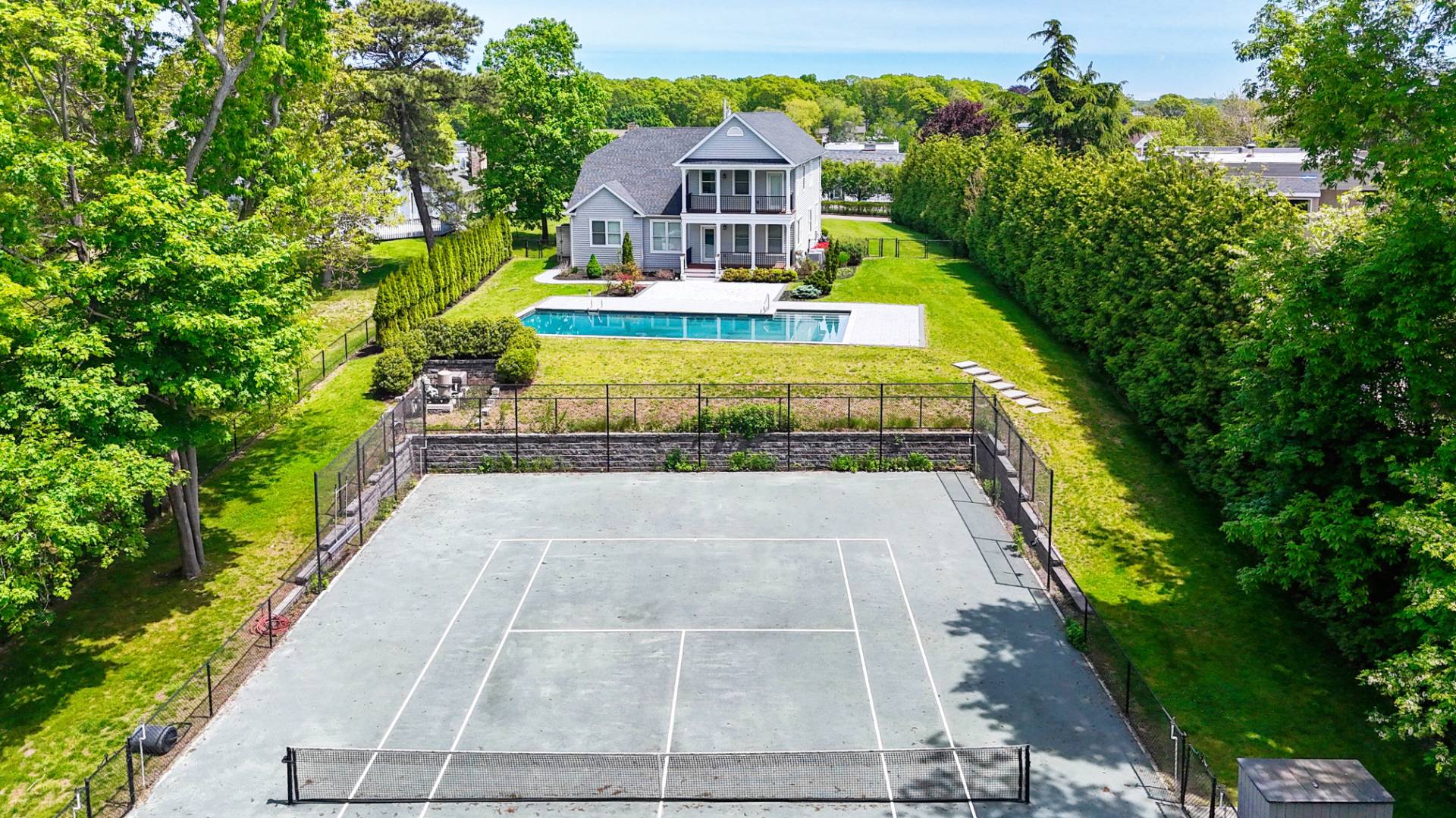 64 Romana Drive Hampton Bays, NY 11946 - Photo 3 of 29 a view of swimming pool with a yard