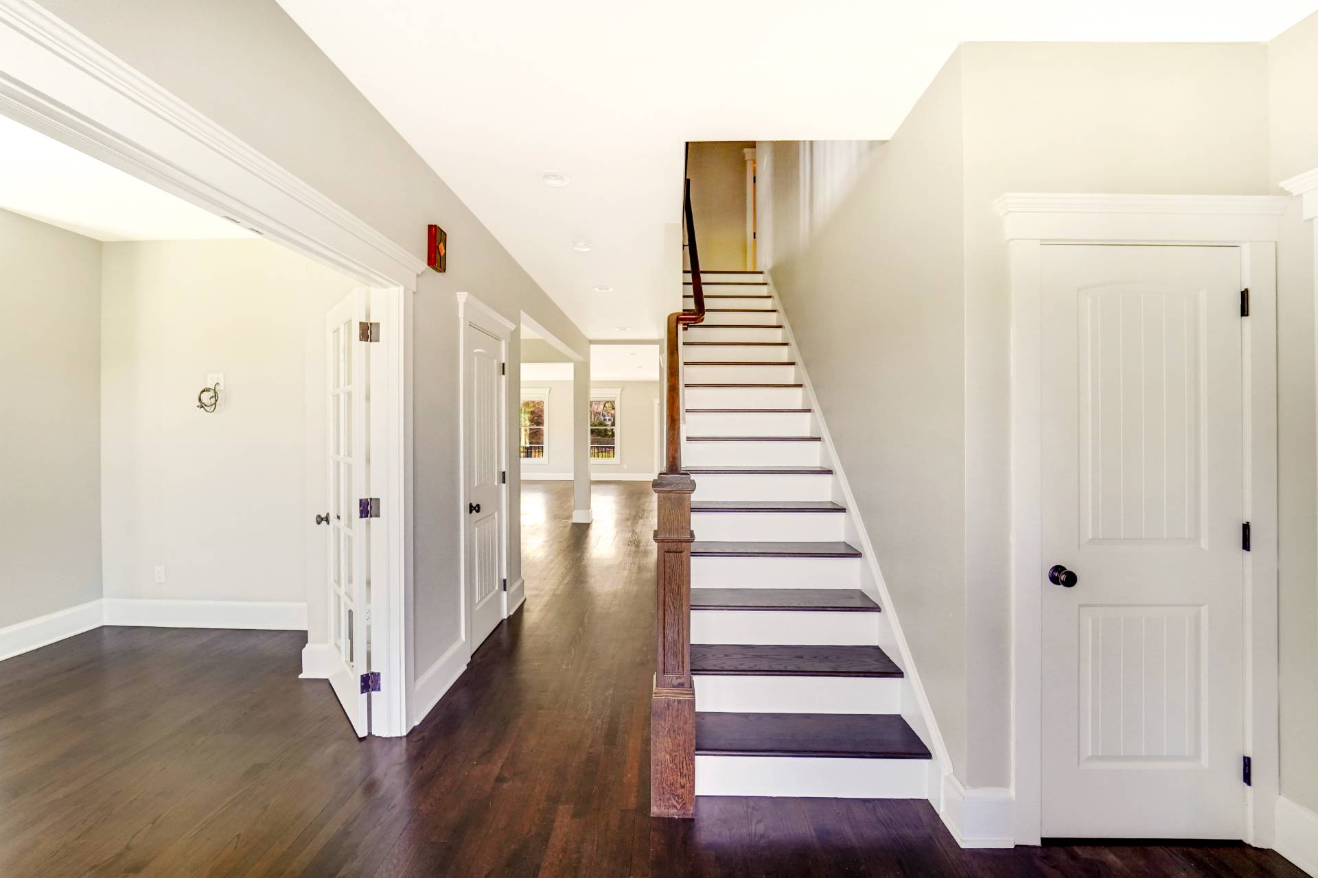 64 Romana Drive Hampton Bays, NY 11946 - Photo 9 of 29 a view of a hallway with wooden floor and entryway