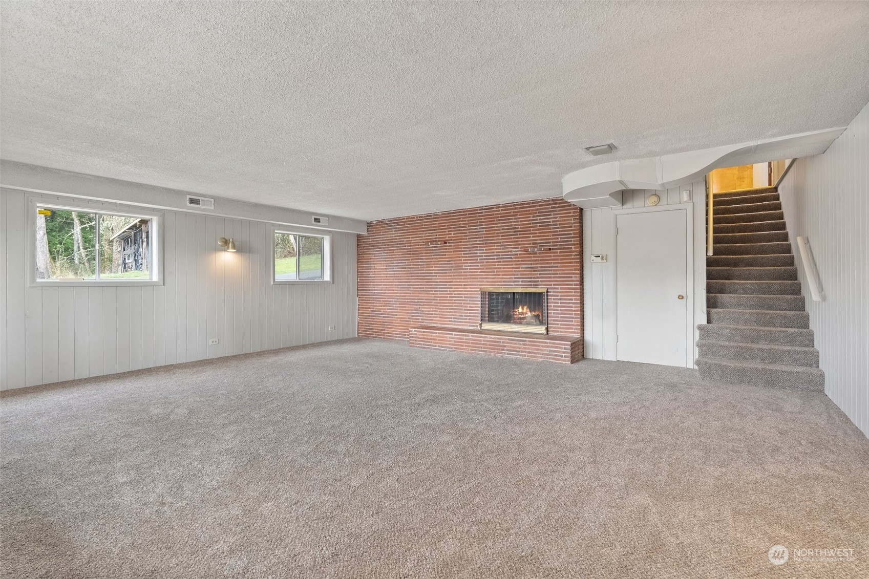 137 Wallace Road Chehalis, WA 98532 - Photo 19 of 39 a view of empty room with windows and fireplace