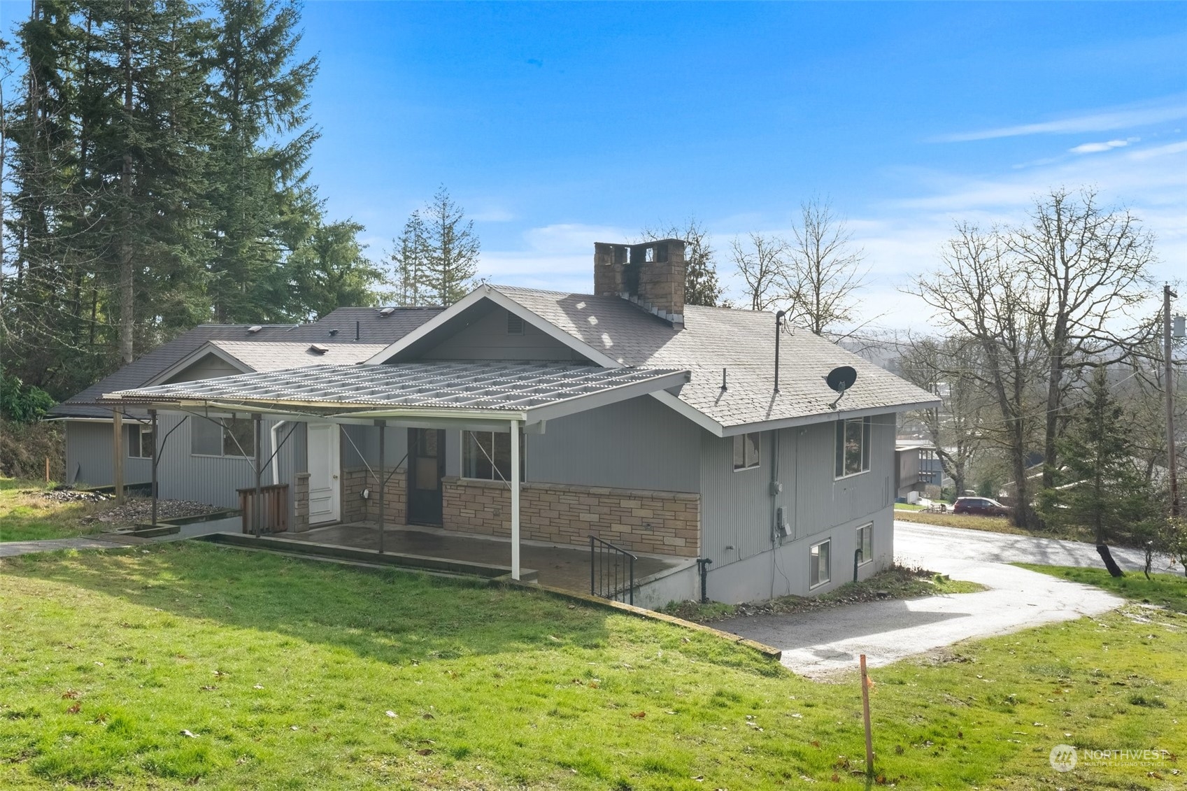 137 Wallace Road Chehalis, WA 98532 - Photo 25 of 39 a view of a house with a backyard and balcony