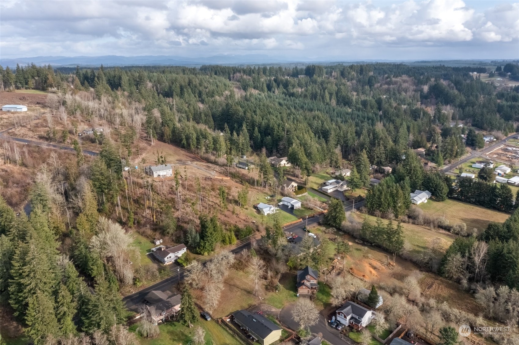 137 Wallace Road Chehalis, WA 98532 - Photo 35 of 39 a view of a yard with wooden fence
