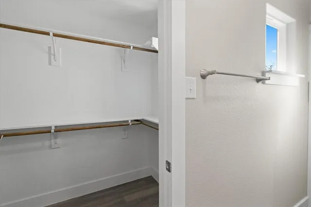 a view of a room with racks on the wall