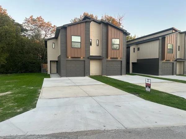 a front view of a house with yard
