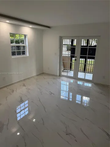 a view of a livingroom with furniture