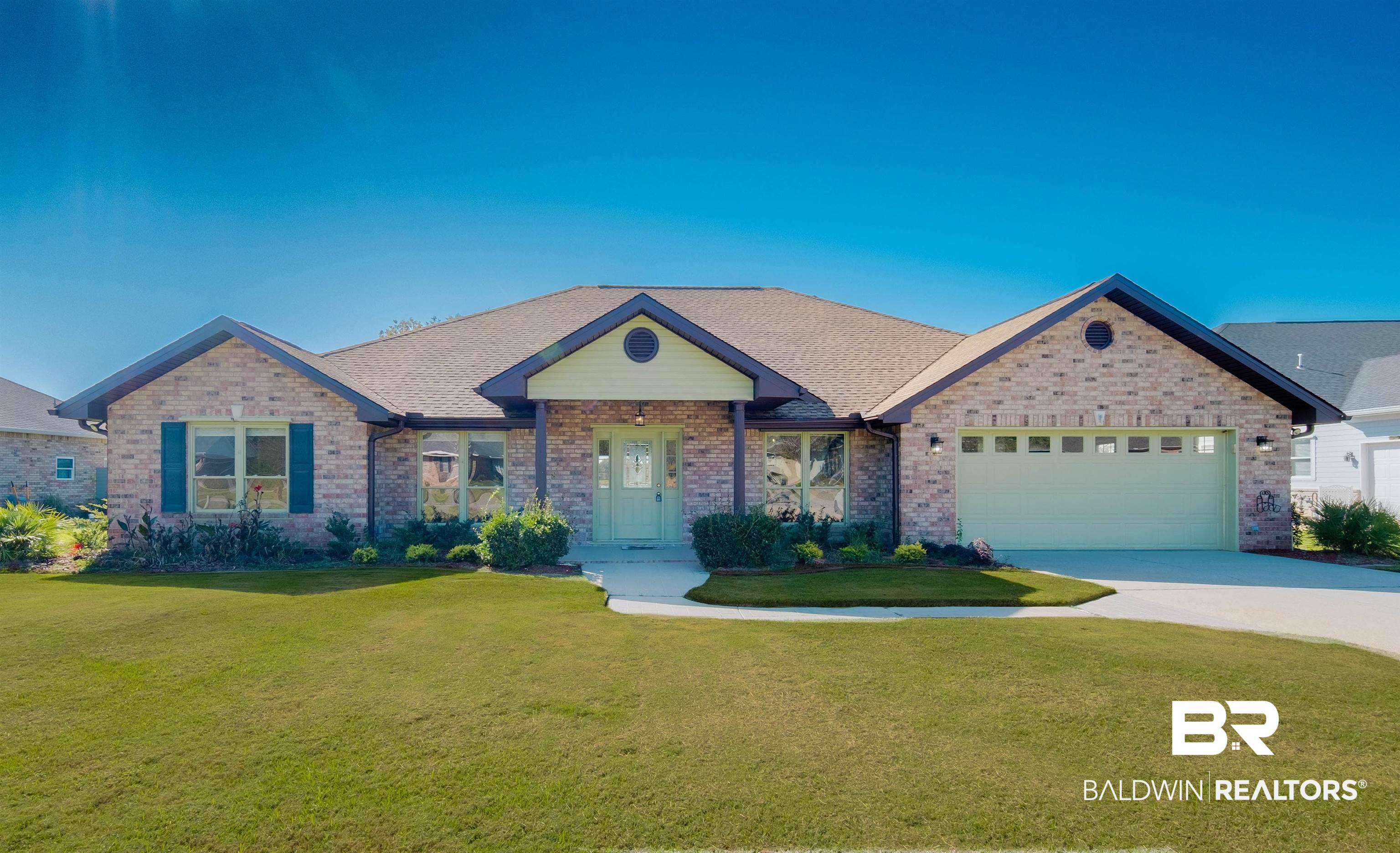 9462 Lakeview Drive Foley, AL 36535 - Photo 1 of 50 Ranch-style home featuring a front lawn and a garage