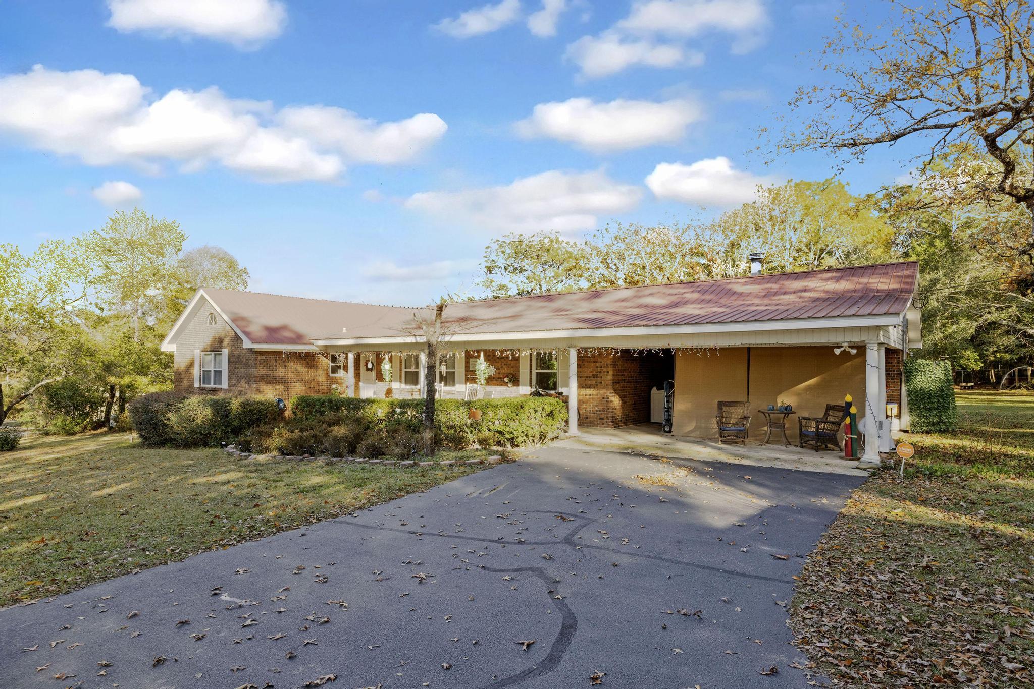 14 Pandora Drive Crestview, FL 32536 - Photo 3 of 40 a view of a house with a patio