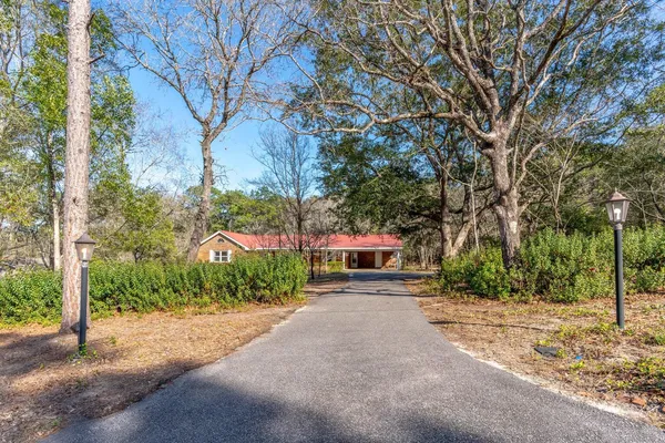 a house with trees in front of it
