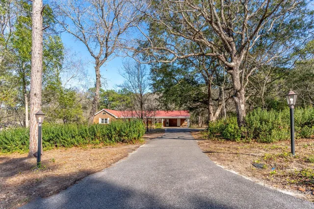 a house with trees in front of it