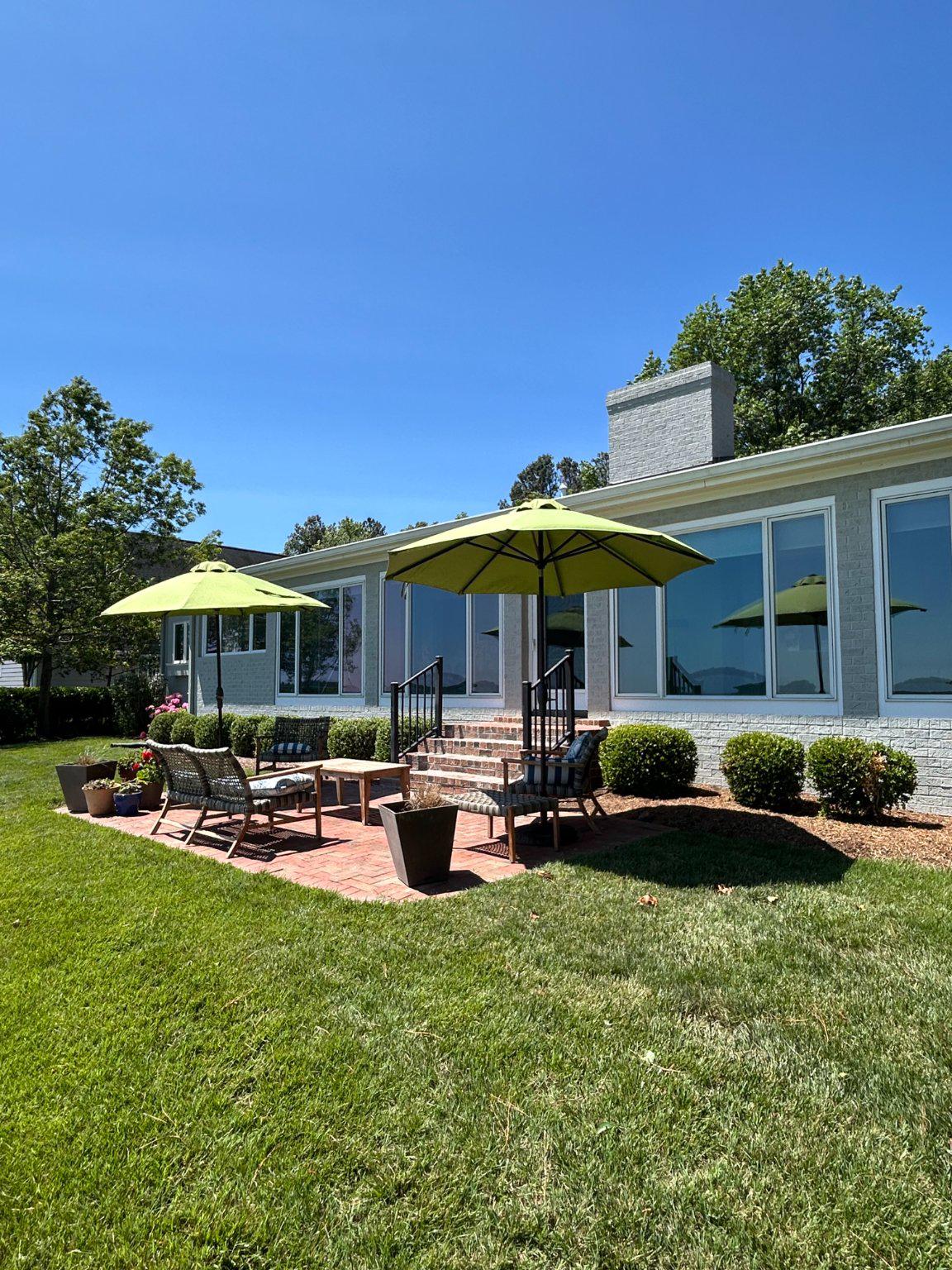 24818 Half Pone Point Road Hollywood, MD 20636 - Photo 3 of 13 Brick patio and enclosed veranda views the river