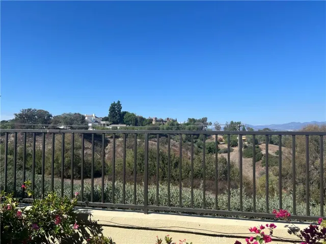 a view of a balcony with an outdoor space