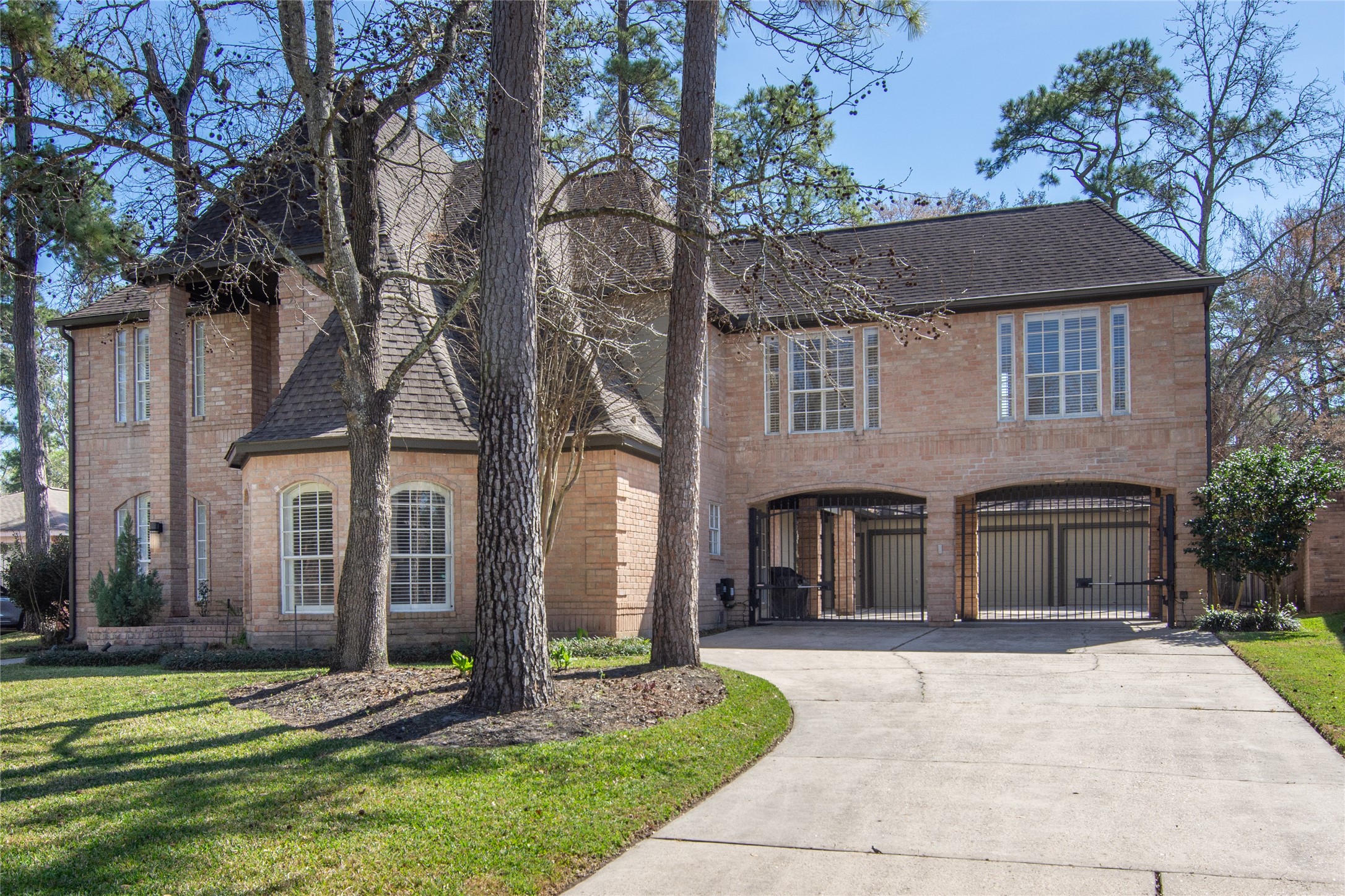 6211 Kingscrest Lane Spring, TX 77389 - Photo 5 of 39 front view of a house with a yard