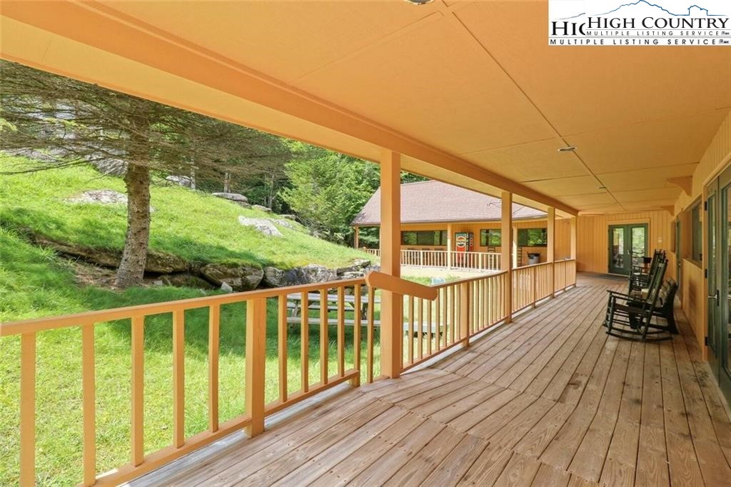 220 Charter Hills Road, Unit B2 Beech Mountain, NC 28604 - Photo 37 of 37 a view of a balcony with wooden floor