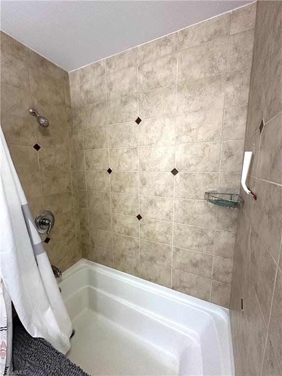 5311 Adrian Road Jamestown, NC 27282 - Photo 13 of 50 Shower/tub in hall bath