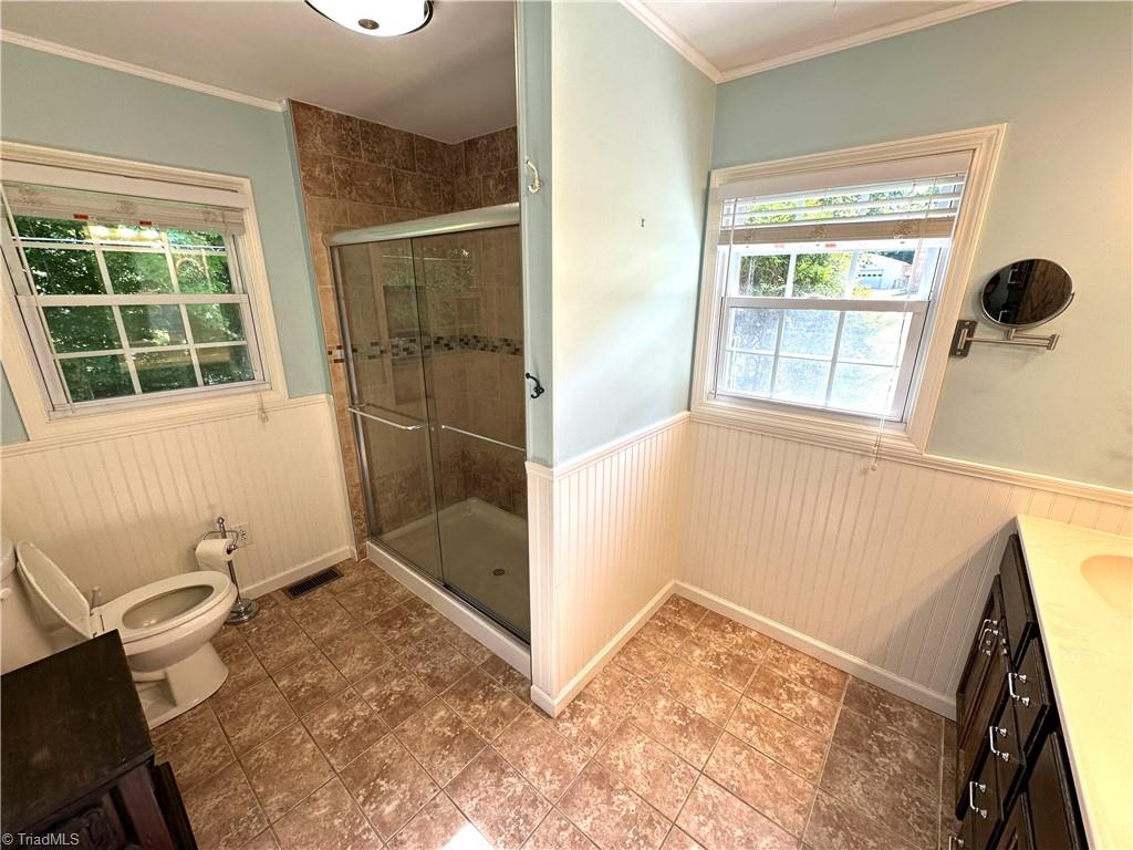 5311 Adrian Road Jamestown, NC 27282 - Photo 21 of 50 EnSuite bathroom with 2 WINDOWS