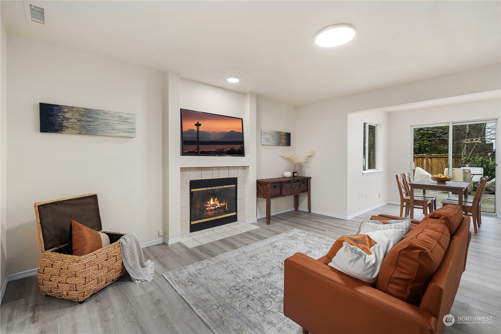 26318 127th Avenue Southeast Kent, WA 98030 - Photo 11 of 40 a living room with furniture and a flat screen tv