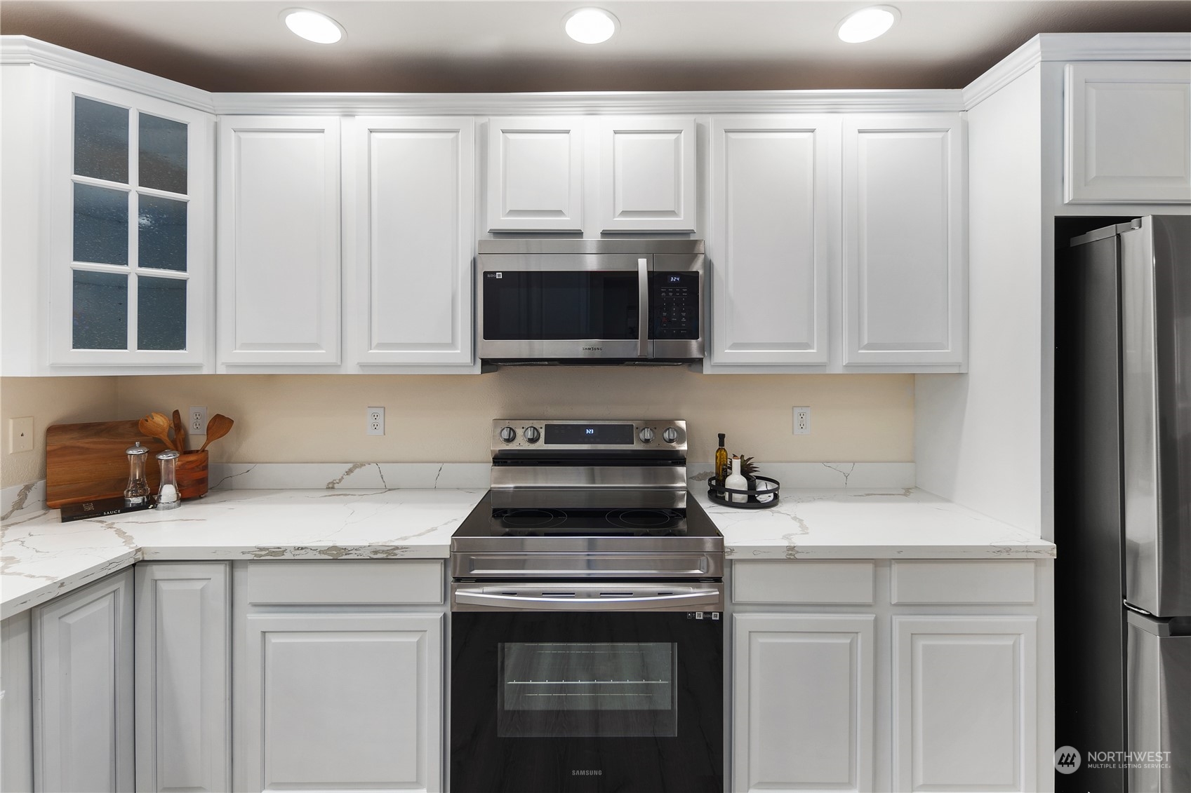 26318 127th Avenue Southeast Kent, WA 98030 - Photo 16 of 40 a kitchen with a stove and a microwave