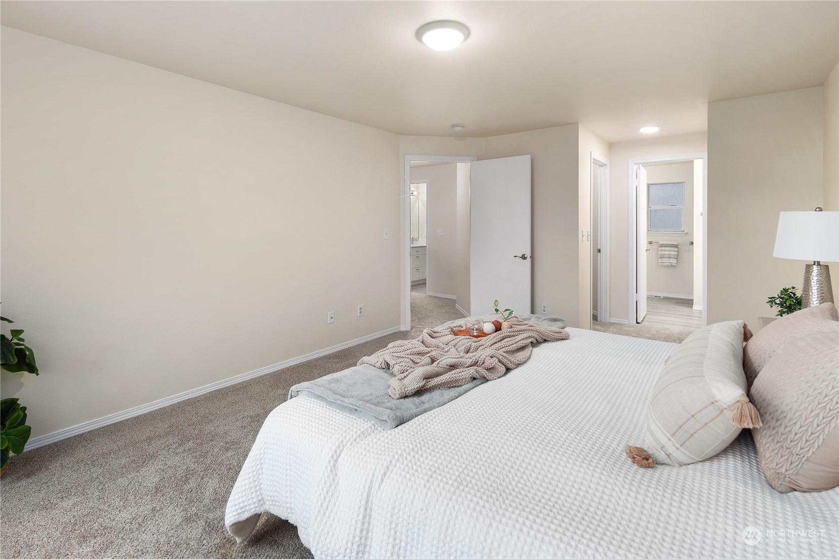 26318 127th Avenue Southeast Kent, WA 98030 - Photo 23 of 40 a bedroom with a bed and a mirror
