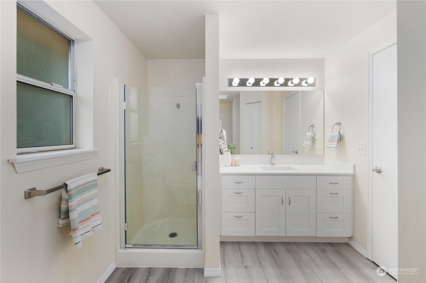 26318 127th Avenue Southeast Kent, WA 98030 - Photo 26 of 40 a bathroom with a sink and a mirror