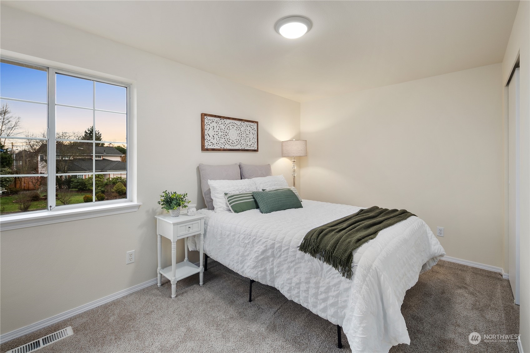 26318 127th Avenue Southeast Kent, WA 98030 - Photo 28 of 40 a bedroom with a bed and a window