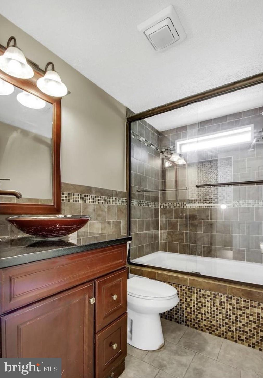 47 Pheasant Ridge Road Hanover, PA 17331 - Photo 23 of 35 a bathroom with a sink a toilet and shower
