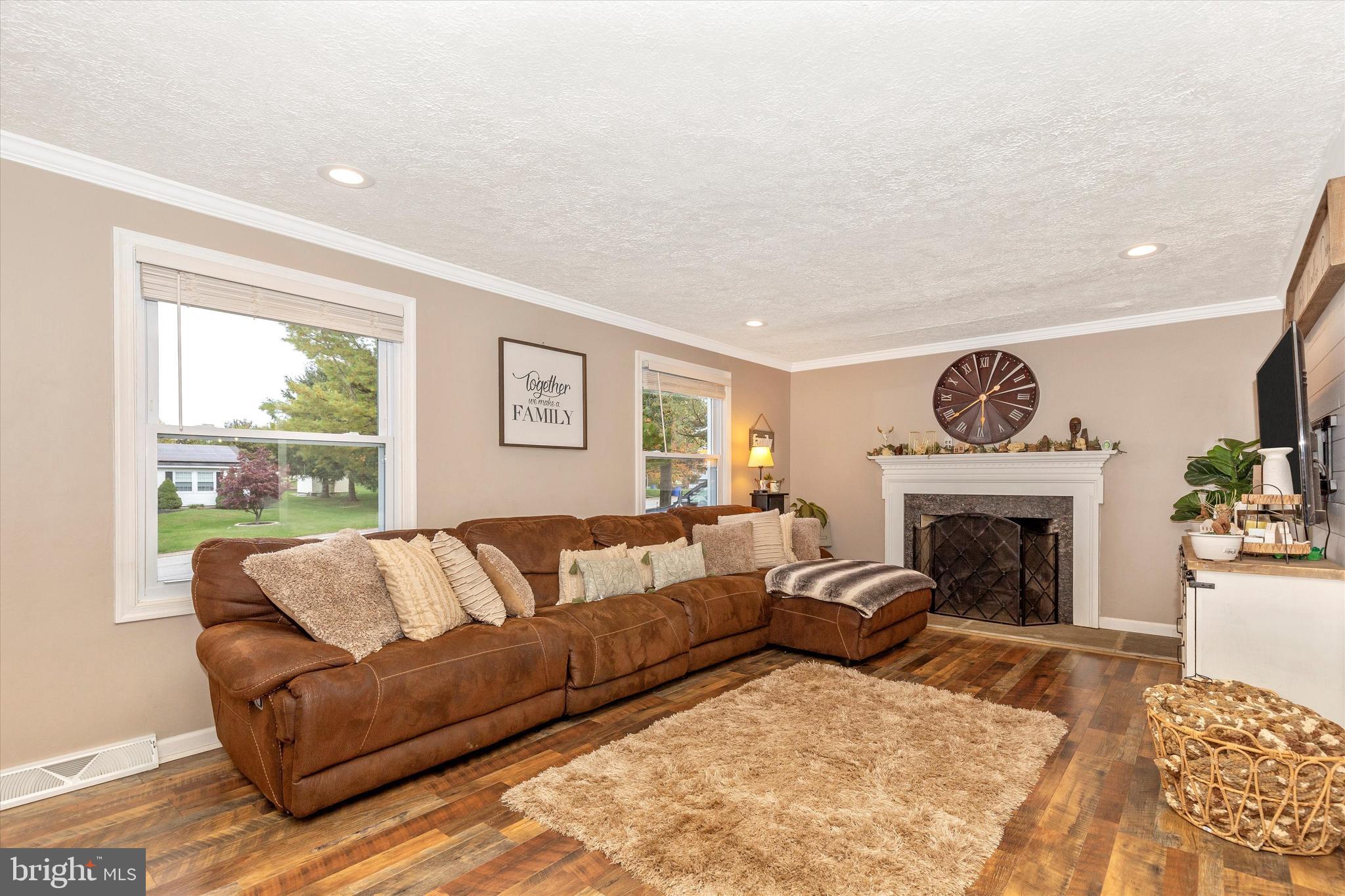 47 Pheasant Ridge Road Hanover, PA 17331 - Photo 6 of 35 a living room with furniture and a fireplace