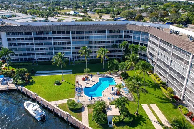 an aerial view of a house with a ocean view