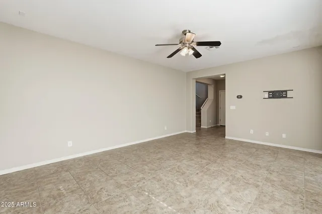 a kitchen with a refrigerator a sink and cabinets