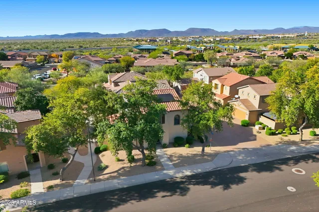 an aerial view of residential house with outdoor space