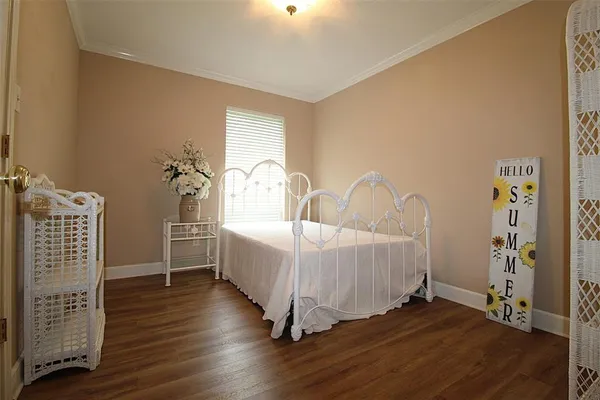 a bed room with a bed and a window