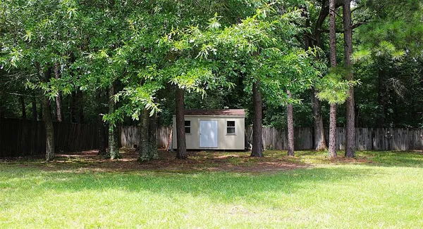 a view of swimming pool with patio